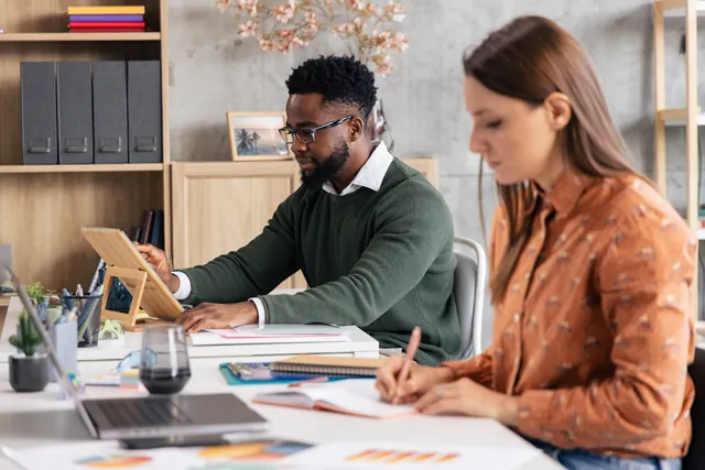 Skilled professionals working together in a bright modern office