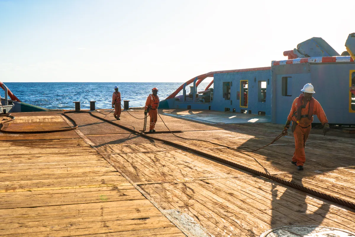 Ship crew working on the deck of a vessel
